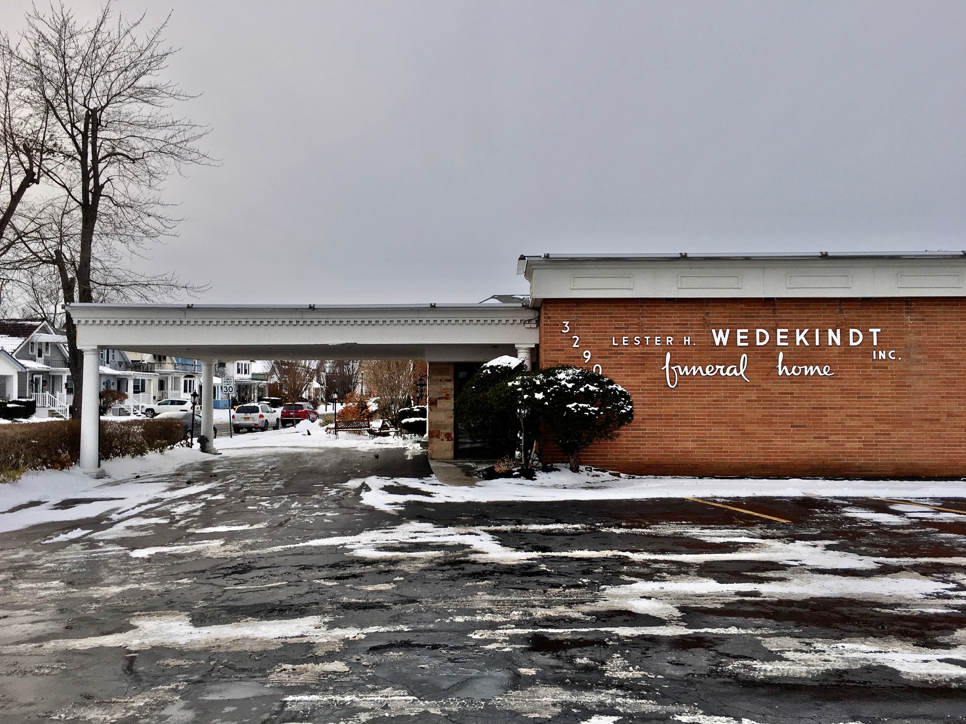 Lester H. Wedekindt Funeral Home exterior and entrance at 3290 Delaware Avenue, photographed in December 2019.